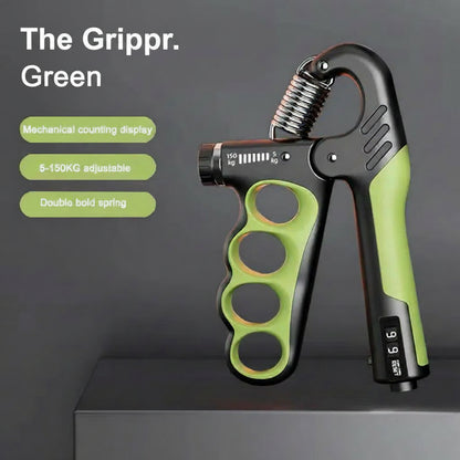 Green and black mechanical counting gripper on a dark background